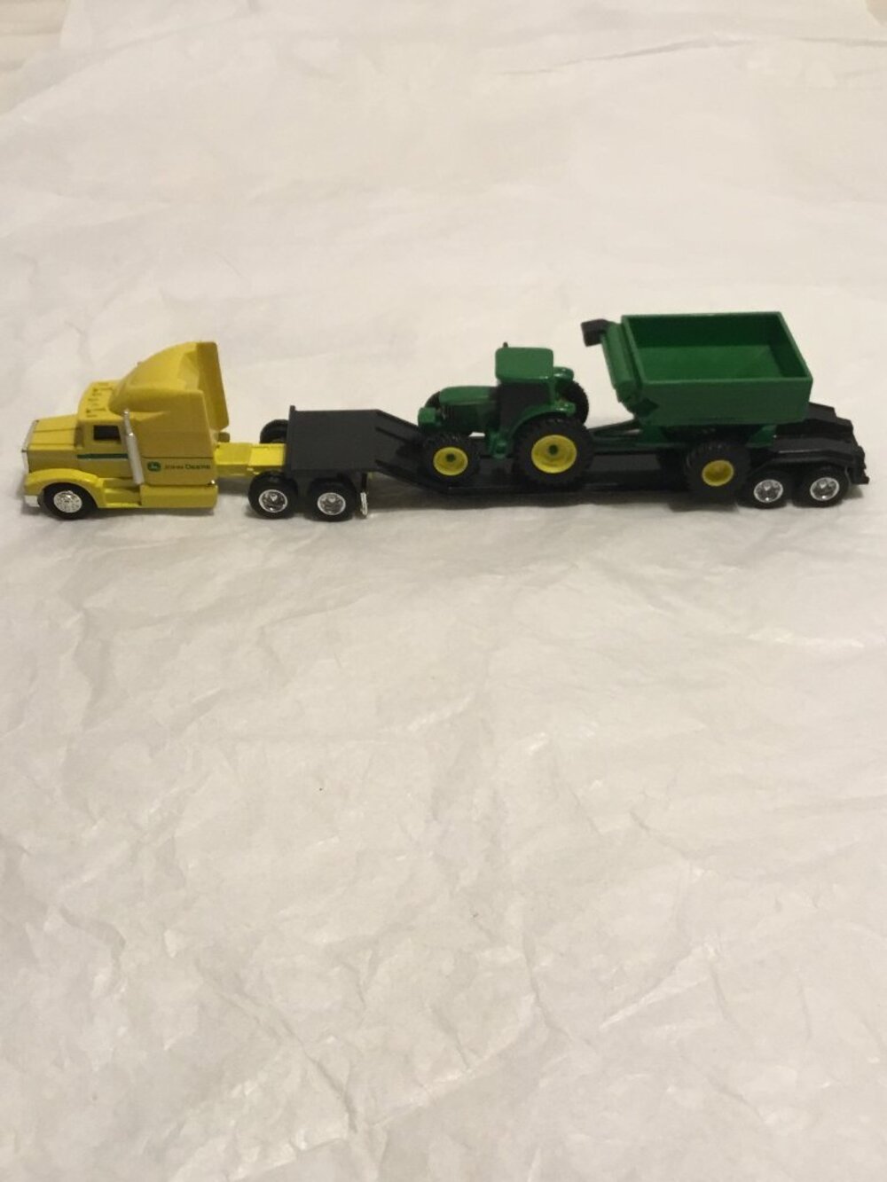 Vintage die cast John Deere tractor trailer and trailer w/ tractor and grain bin